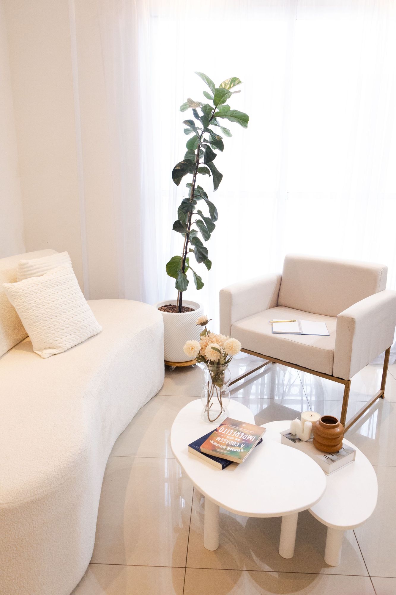 Ivory bouclé curved sofa