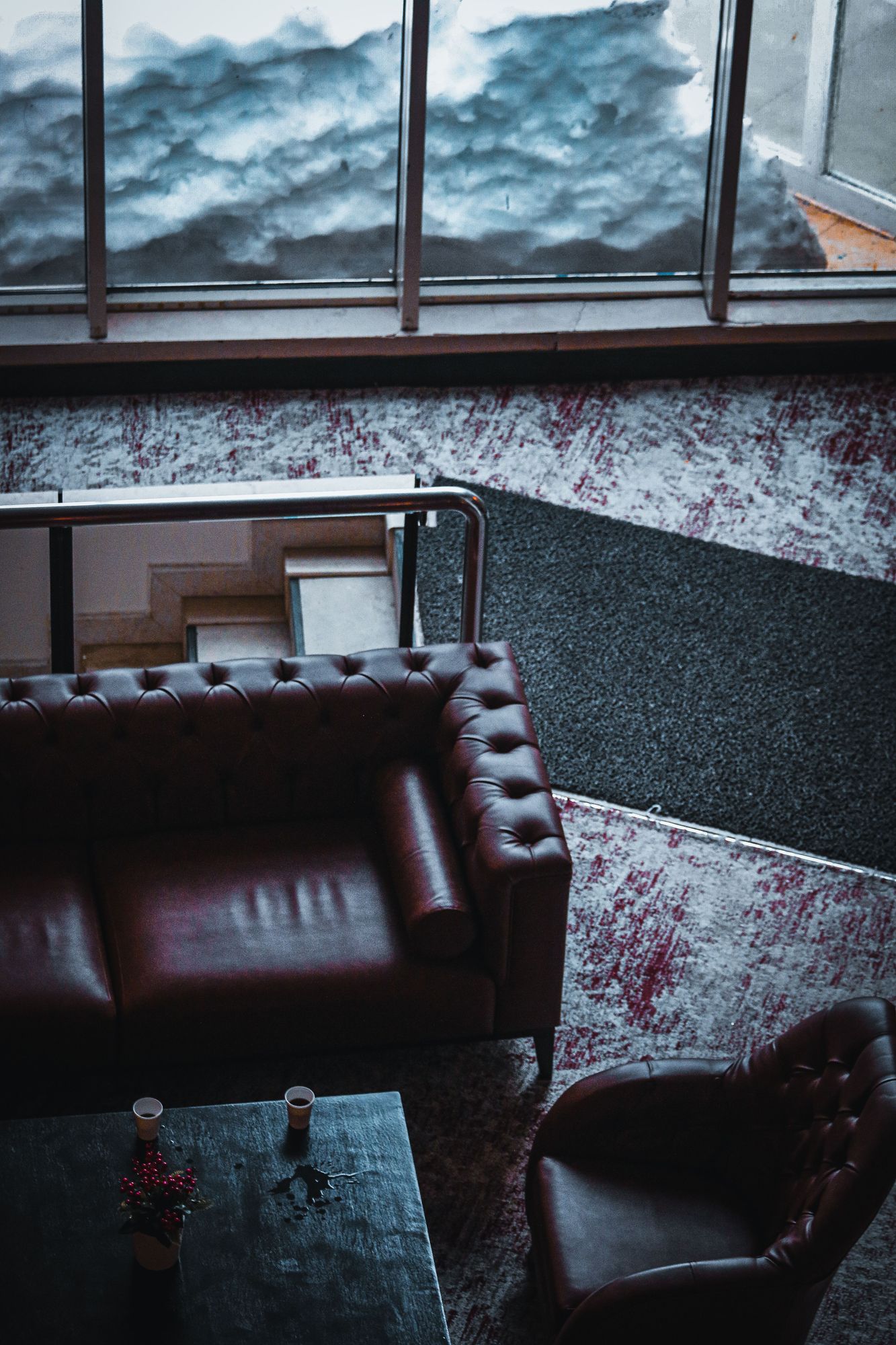 Oxblood leatherette chesterfield sofa
