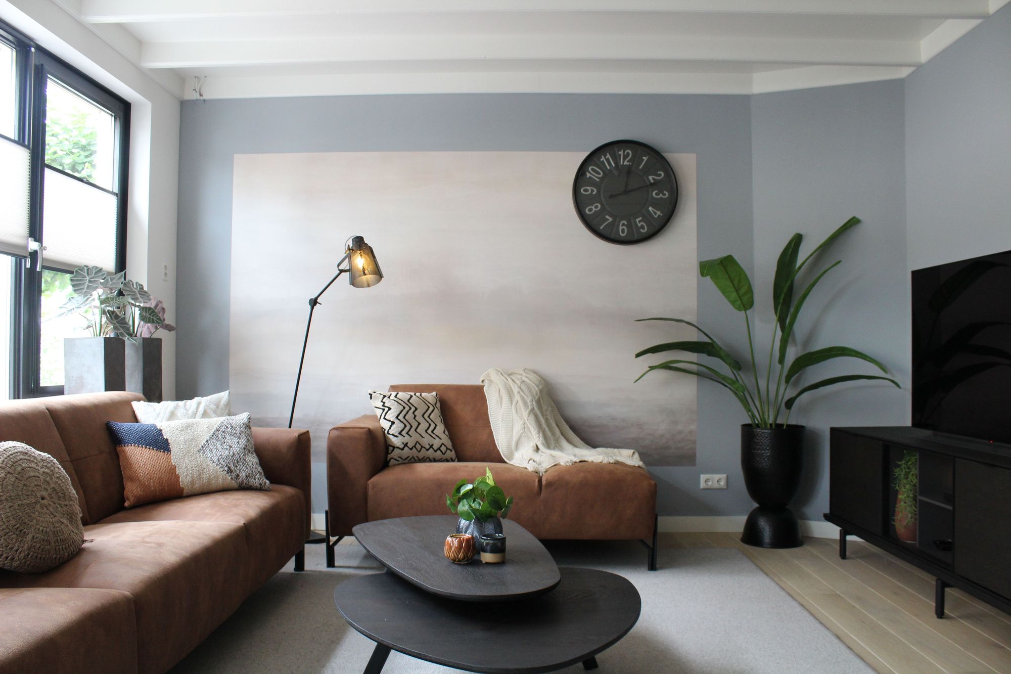 Tan leatherette sofa in a modern living room